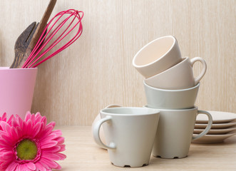 Coffee cups collection on wooden background