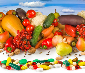 image of different vegetables and pills closeup