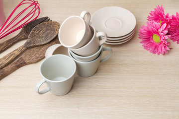 Coffee cups collection on wooden background