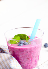 Blueberry shake on white table