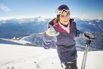 Fotobehang Wintersport Ski. Happy sport woman in snowy mountains