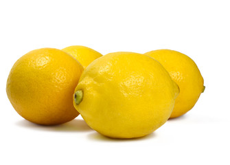 Fresh organic lemons, isolated on white background.
