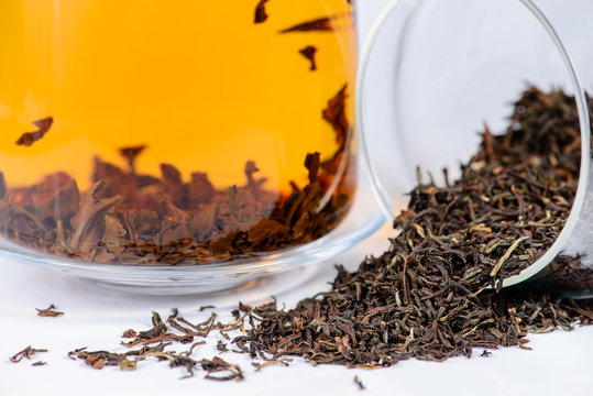 close-up of spilled black tea Golden Nepal Ilam, shallow DOF