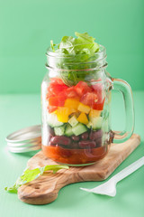 vegan bean vegetable salad in mason jars