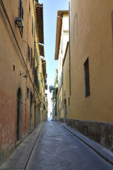 City landscape. The street without people between high houses