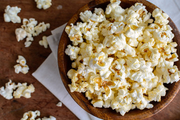 Popcorn on wooden table