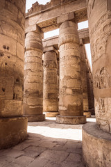 A sandstone column in Egypt.  columns covered in hieroglyphics