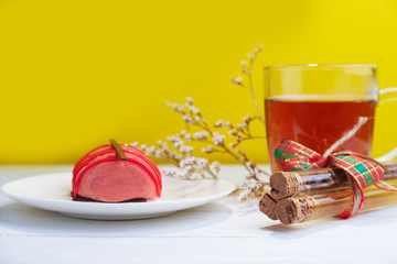 Mini cake with  strawberry creamy mousse and tea