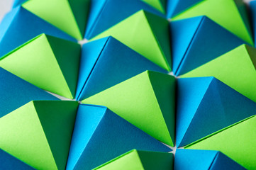 Blue, green and yellow tetrahedrons background. Great for using in web.