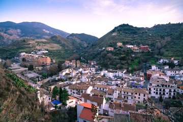 Fototapeta na wymiar Evening light. Top view of the beautiful village of Monachil. Province of Granada. Spain