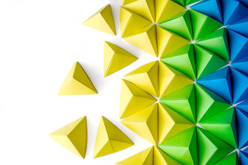Origami tetrahedrons background. Futuristic polygonal composition with copy space on the left side. - obrazy, fototapety, plakaty