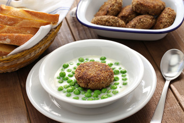 green peas fozelek (thich vegetable stew) and fasirt (fried meatball), hungarian cuisine