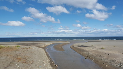 Fototapeta na wymiar Estuary, blue sky and white cloud 