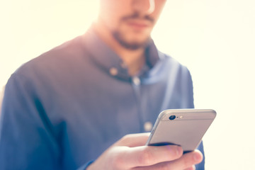 Businessman working on the smartphone