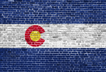 Colorado US flag painted on old vintage brick wall