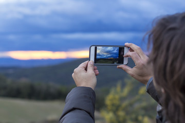 Man takes picture of lightning bolt