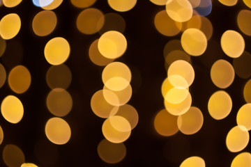 Blurred background night photo. Background out of focus. Can use as wallpaper, design. Fairy defocused photo.
