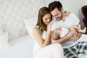 Happy family with newborn baby
