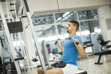 Young black man training in the gym
