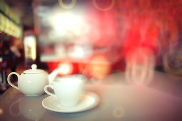 cup of tea at a cafe blurred background