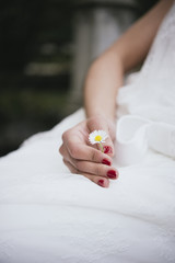 woman's hand with flower