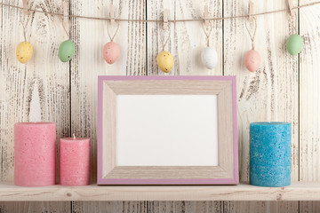 Easter decoration with blank wooden frame