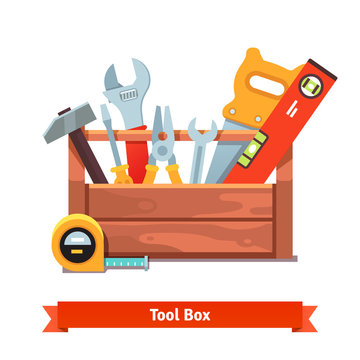 Wooden toolbox full of equipment