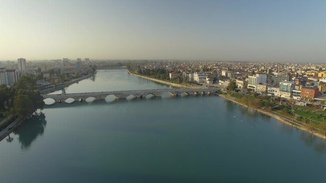 Ancient Stone Bridge in Adana Turkey aerial footage in the morning