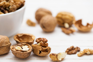 walnuts on white wooden background