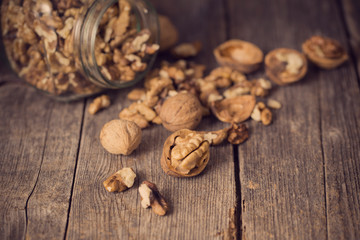walnuts on rustic old wooden table