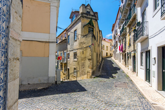 Small alley in the Alfama district in Lisbon, Portugal