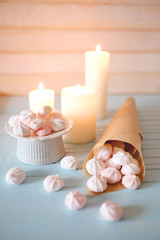 Fototapeta na wymiar Protein based dessert. White and pink marshmallows on porcelaine