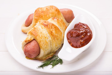 Homemade fresh sausage in the dough