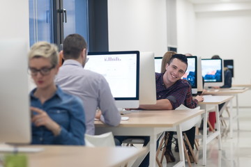 startup business, software developer working on desktop computer