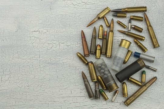 Different types of ammunition. Bullets of different calibers and types. The right to own a gun. Sales of weapons and ammunition.
