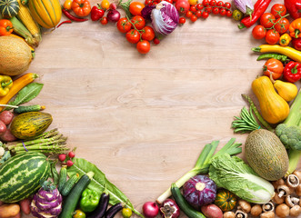 Heart shaped food / food photography of heart made from different fruits and vegetables on wooden table