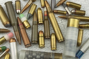 Different types of ammunition. Bullets of different calibers and types. The right to own a gun. Sales of weapons and ammunition.
