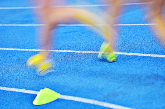 Blurred athletes on the sprint track