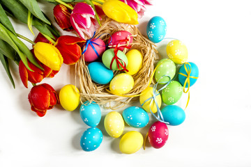 Fototapeta na wymiar tulips and Easter eggs not white background