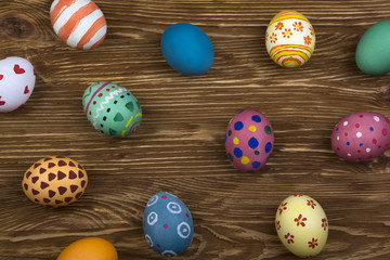Easter eggs on wooden background.