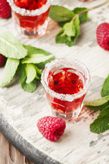 Cold Raspberry cocktail with mint