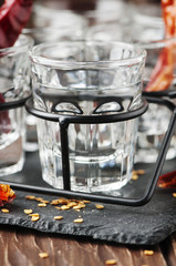 Chili peppers and glasses of vodka