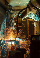 Welding robots movement in a car factory