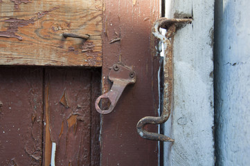 old iron hook closed door