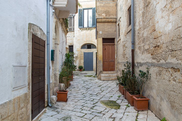 UNESCO Polignano a Mare, street view in small town built on rocks in Bari, Apulia, Italy