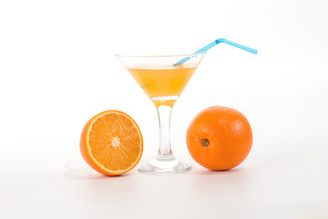 glass of orange juice with a straw to drink