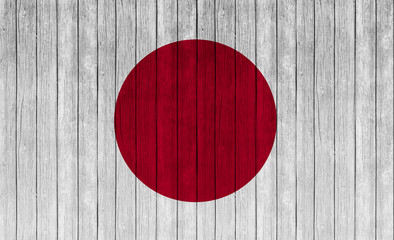 japanese flag on wood texture background