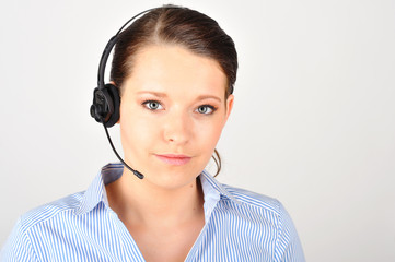 Dark haired woman with headset