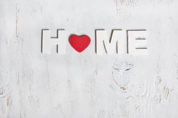 the word home made of wooden  letters on a white background old