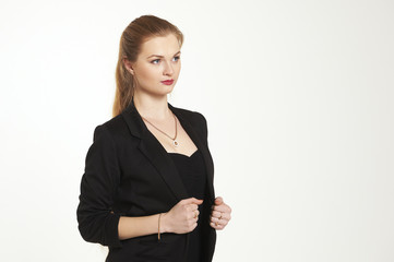 Obraz premium Business woman in a black suit